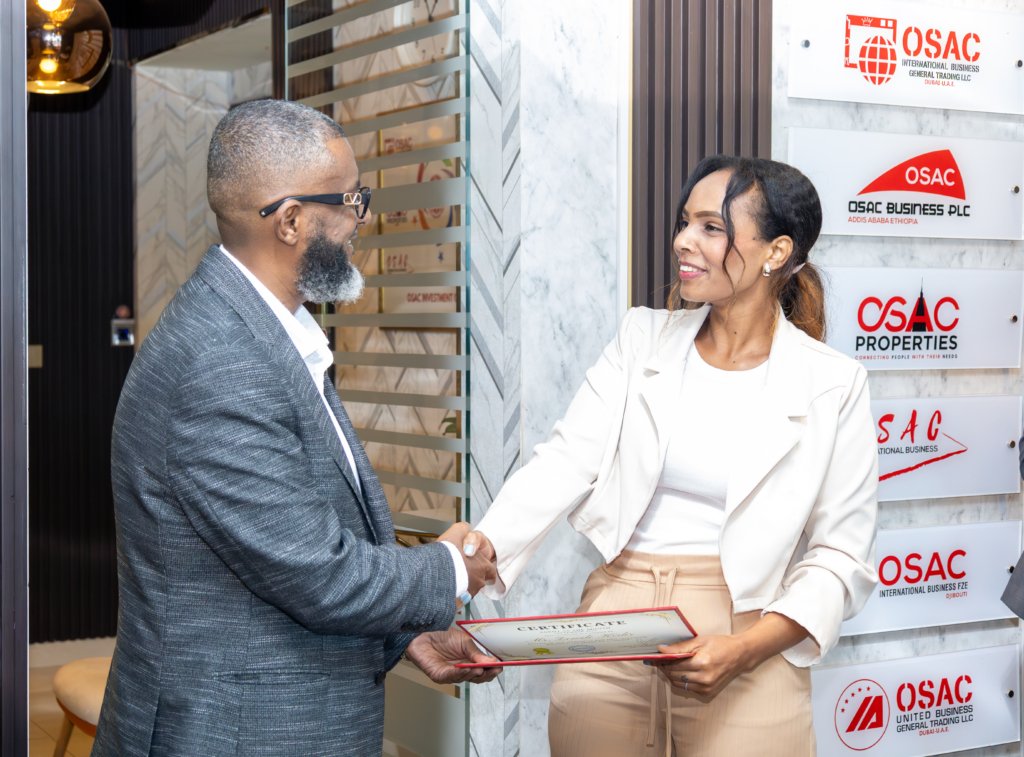 Osman Abdu Wahabrebi Ceo of osac properties and Zewdi Mekonen Agent of the month at osacproperties